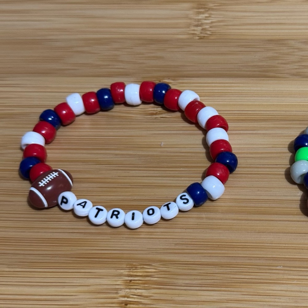 New England patriots 7 to 8 inch bracelet red white and blue beads .